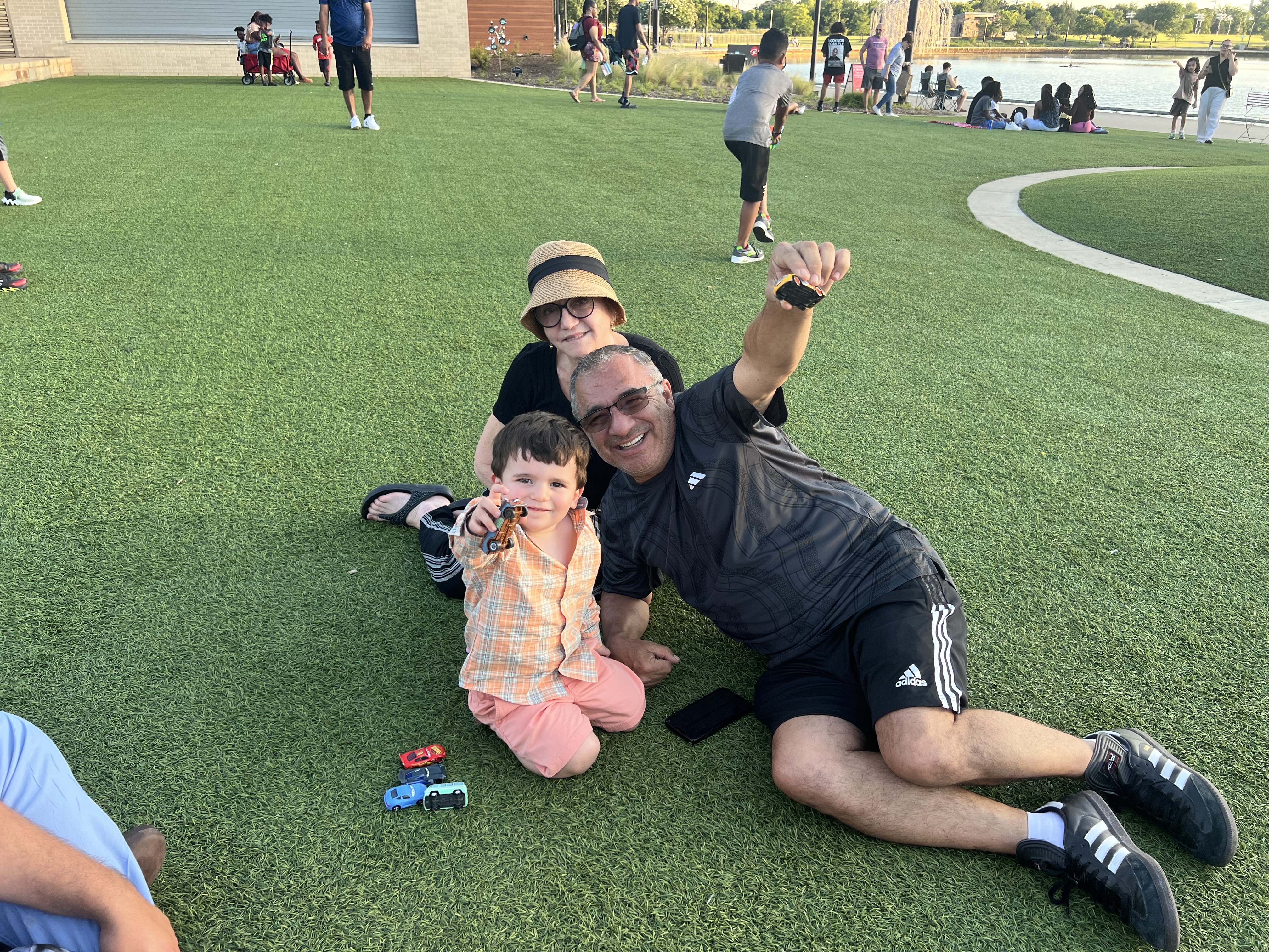 Family relaxing together at the park
